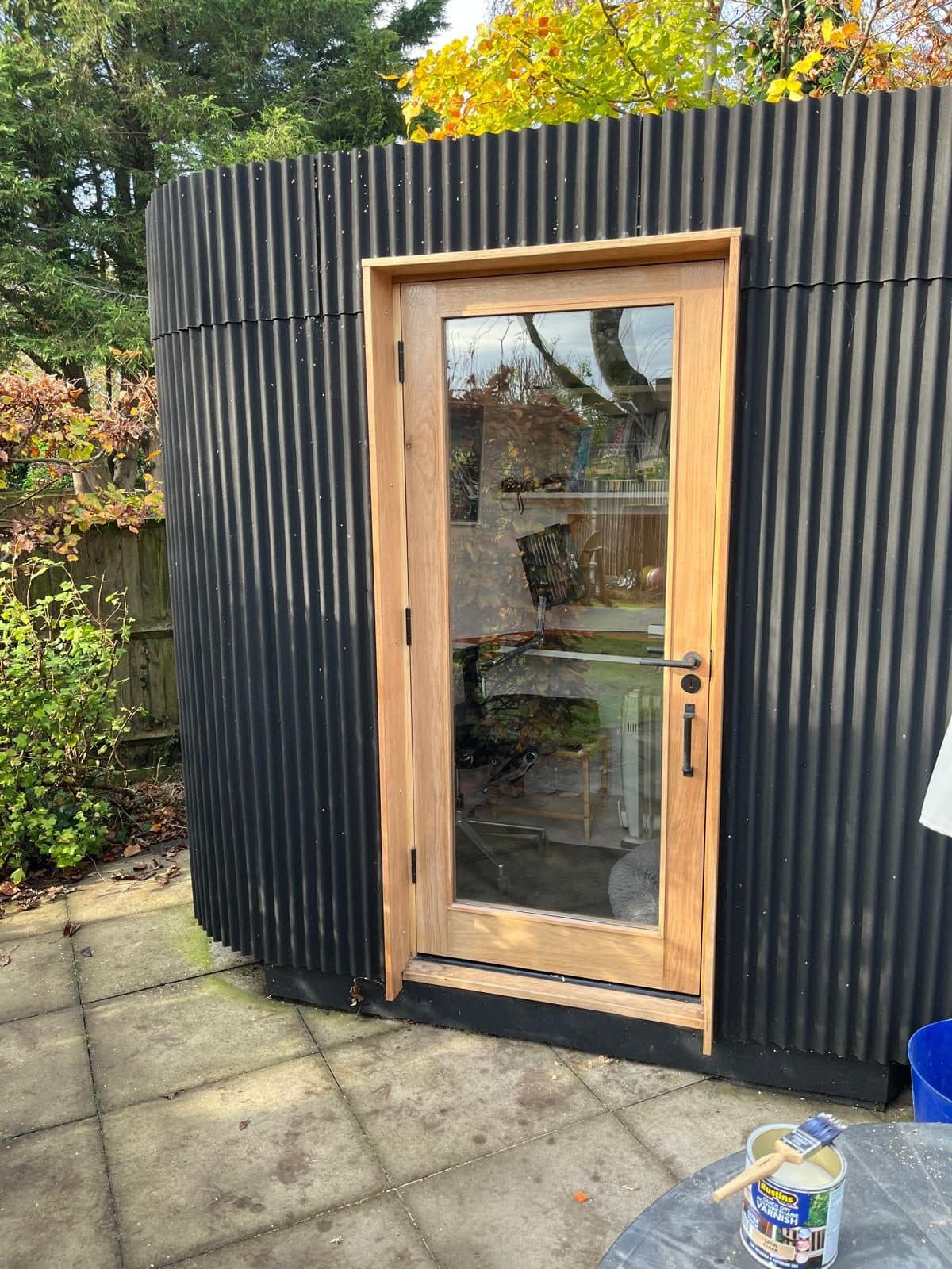 Oak door and frame on a garden office