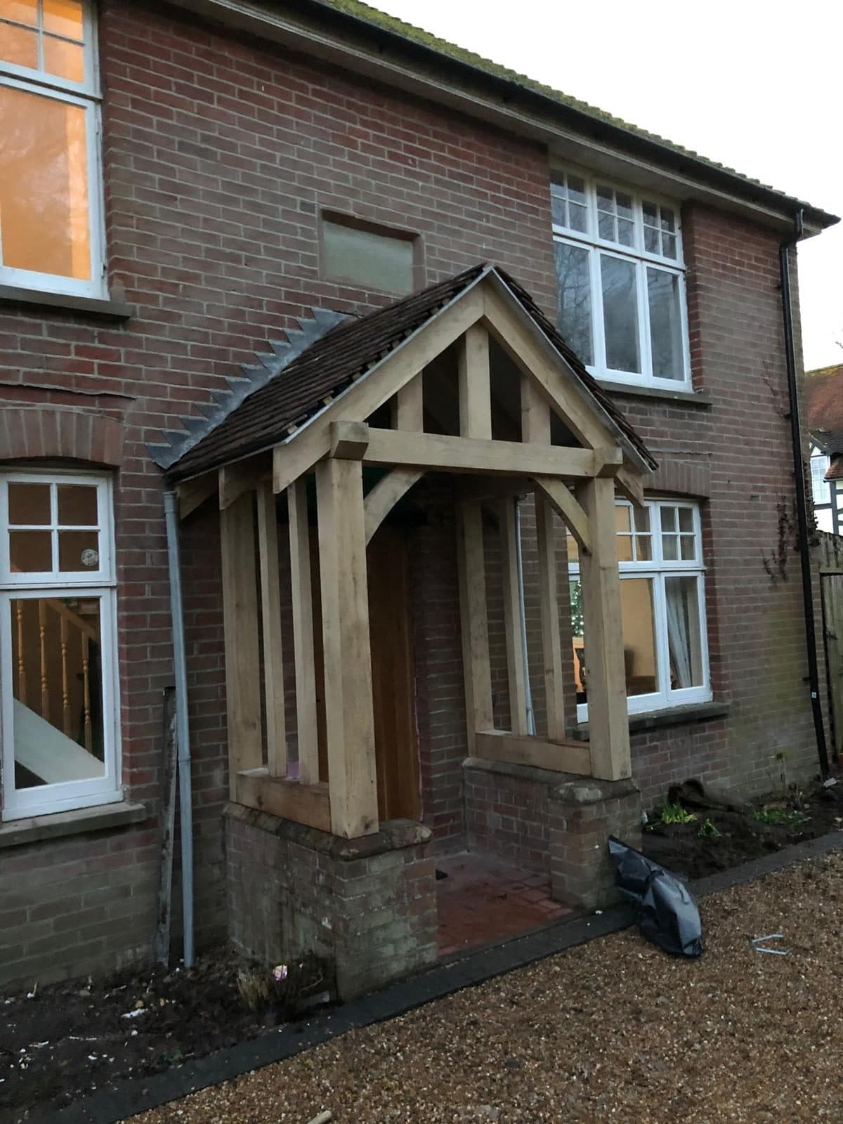 Oak framed porch on a brick house