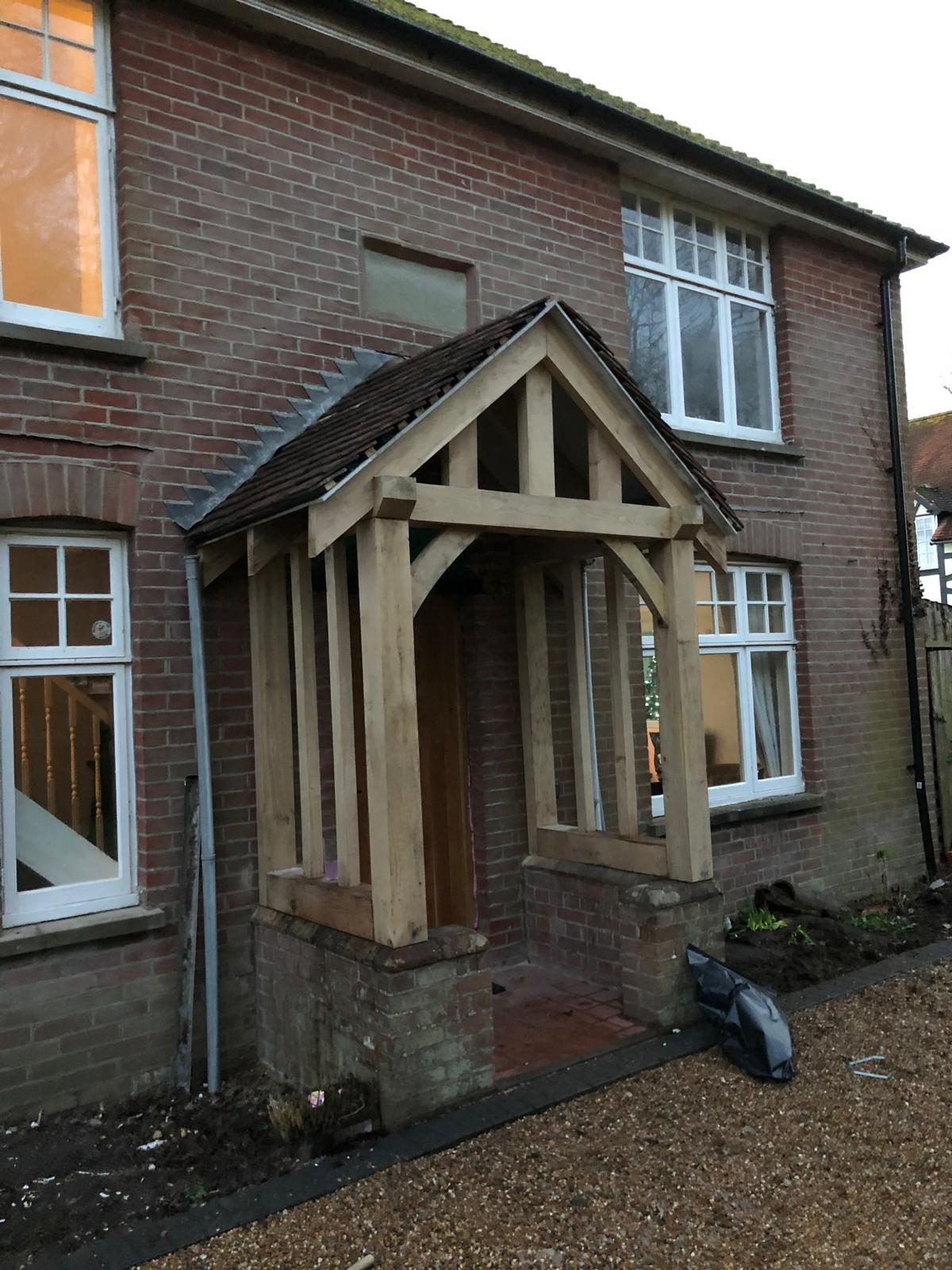 Oak framed porch on a brick house