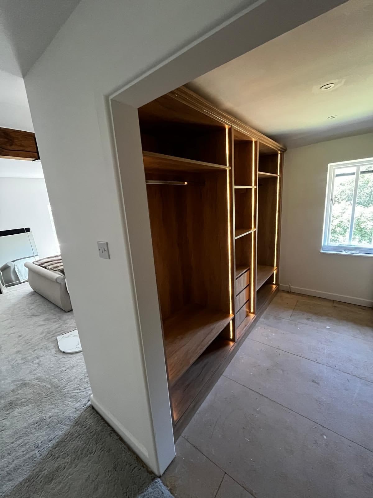 Fitted walk in wardrobe, photograph 12