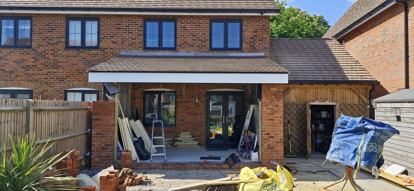 Single storey extension with bifolds, photograph 1